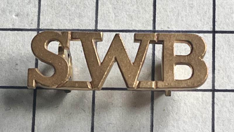 South Wales Borderers (SWB) Small Officer Pattern Brass Shoulder Title Badge