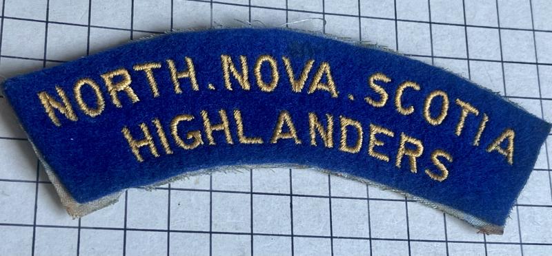 c1943-45 WW2 Canadian North Nova Scotia Highlanders Canada Shoulder Cloth Title Badge