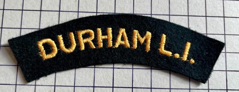 c1950s Durham Light Infantry (DLI) Yellow on Dark Green Embroidered Army Cloth Shoulder Title Badge