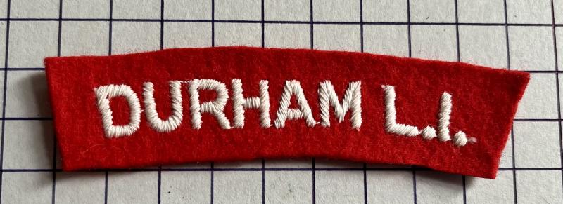 cWW2 Durham Light Infantry (DLI) Regiment 'Paste Back' Cloth Shoulder Title Badge