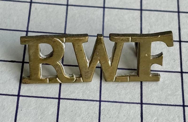 Royal Welsh / Welch Fusiliers (RWF) Brass Shoulder Title Badge