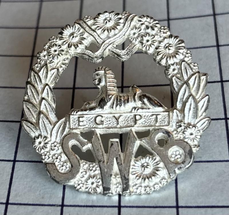 Welsh South Wales Borderers (SWB) Regimental Officer’s Silver Washed Cap Badge