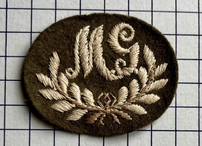 cWW2 Machine Gunner's (MG) Paste Back Trade Patch Cloth Badge